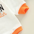 Pumpkin Crew-Neck Romper — Cuff detail