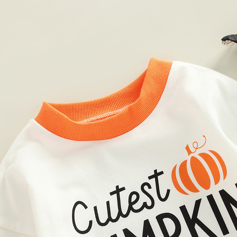 Pumpkin Crew-Neck Romper — Neckline detail