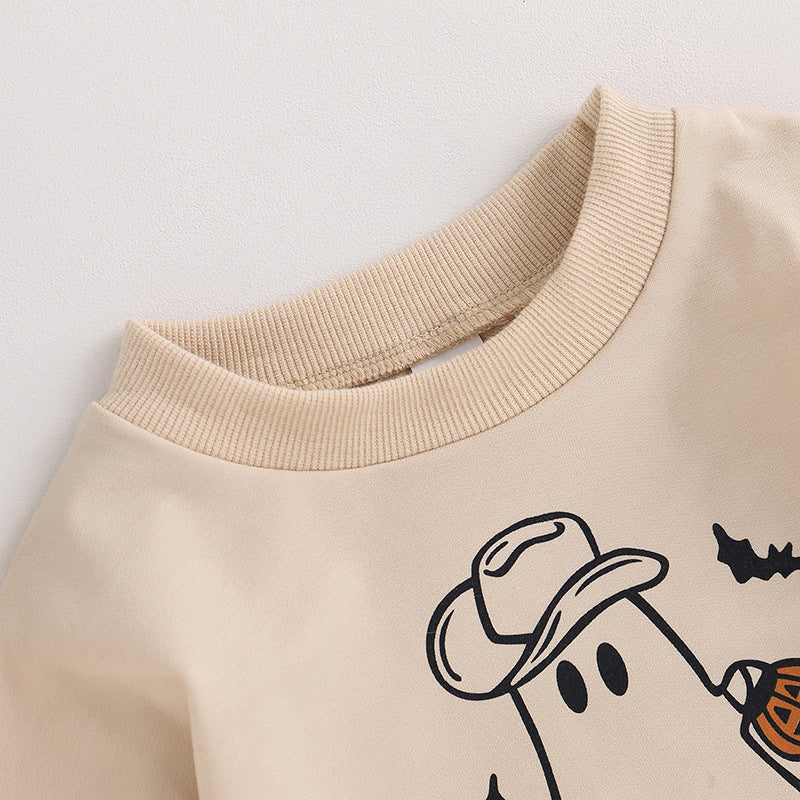 Beige Cotton Baby Romper — Neckline and print detail