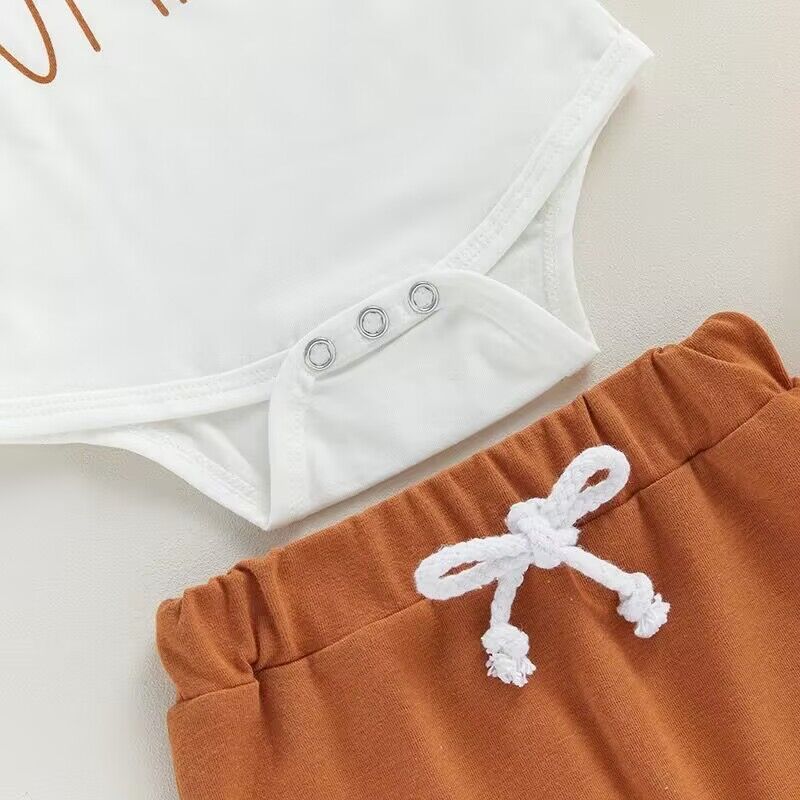 Pumpkin Three-Piece Baby Set — Fastening and waistband detail